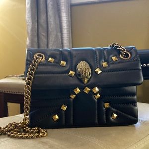 Small black crossbody by Kurt Geiger. Check out the designer.